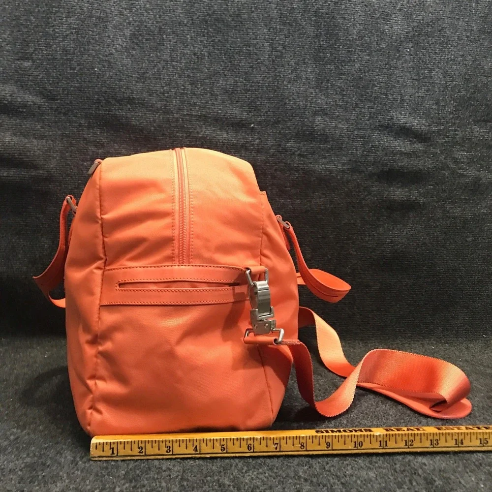 Tumi Model 4892MLN Voyageur Tangerine Nylon Weekender Travel Shoulder Duffel Bag